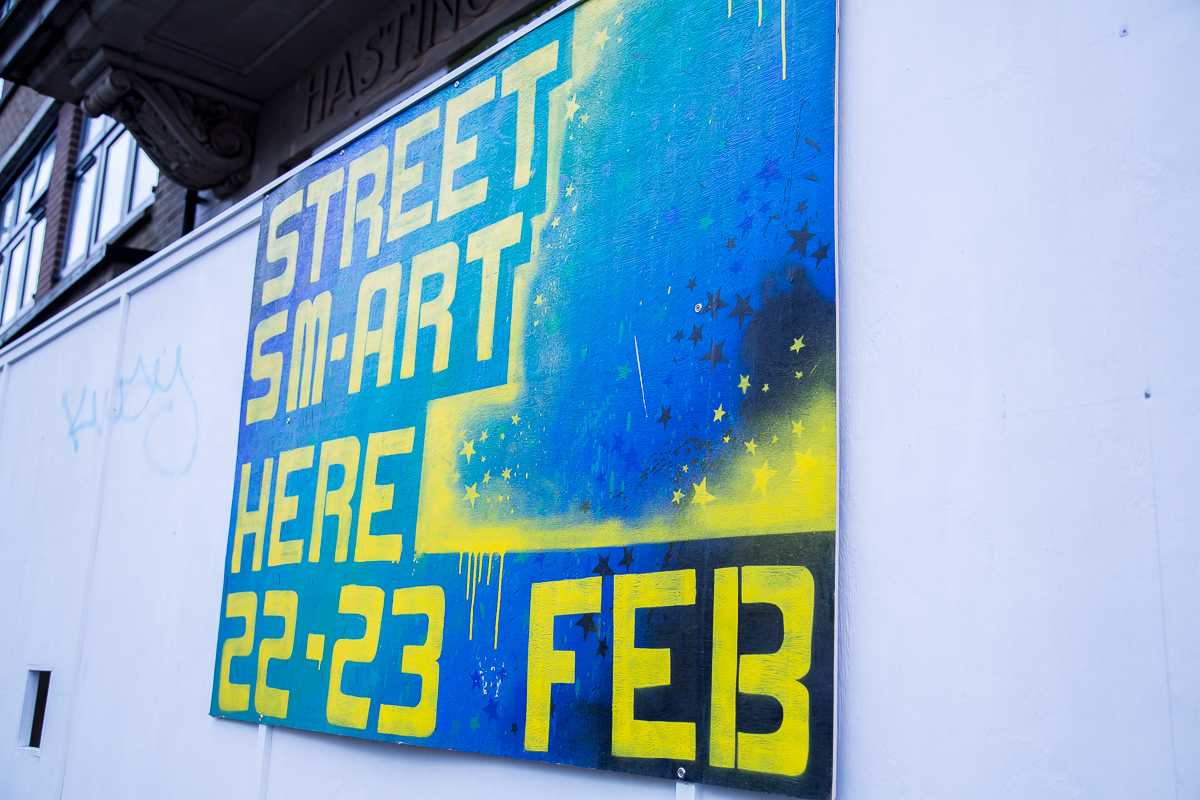 Photo of spray painted poster advertising Streetsmart on 22 and 23 Feb at the Observer Building