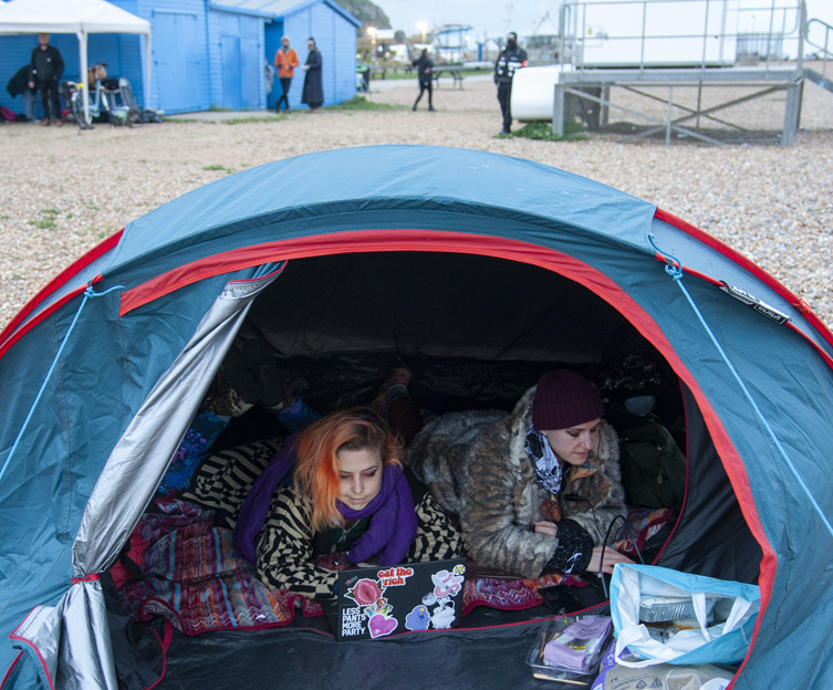 Women in tent at Semaphore event on Hastings beach